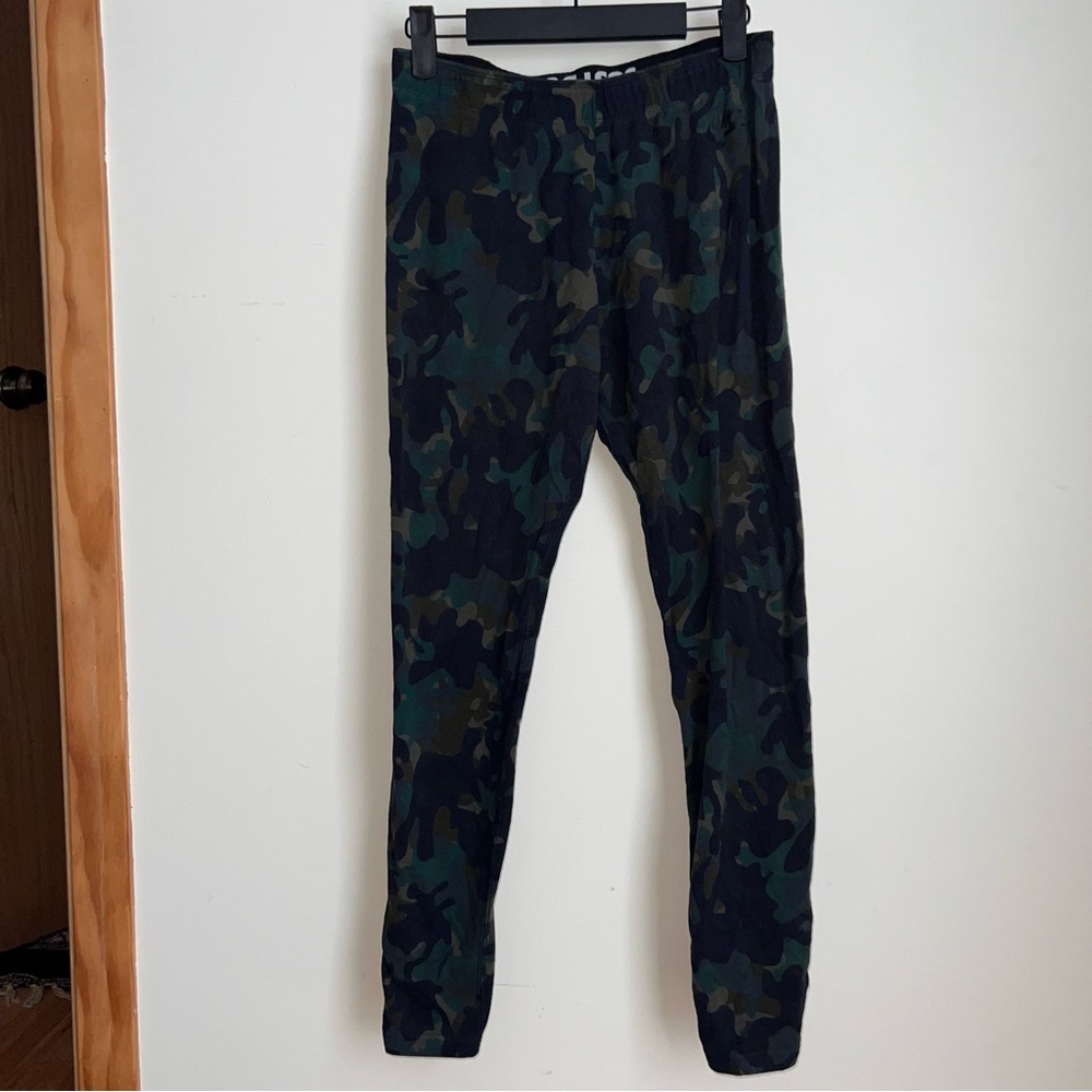 Nike Camo Print Leggings
• Size Medium